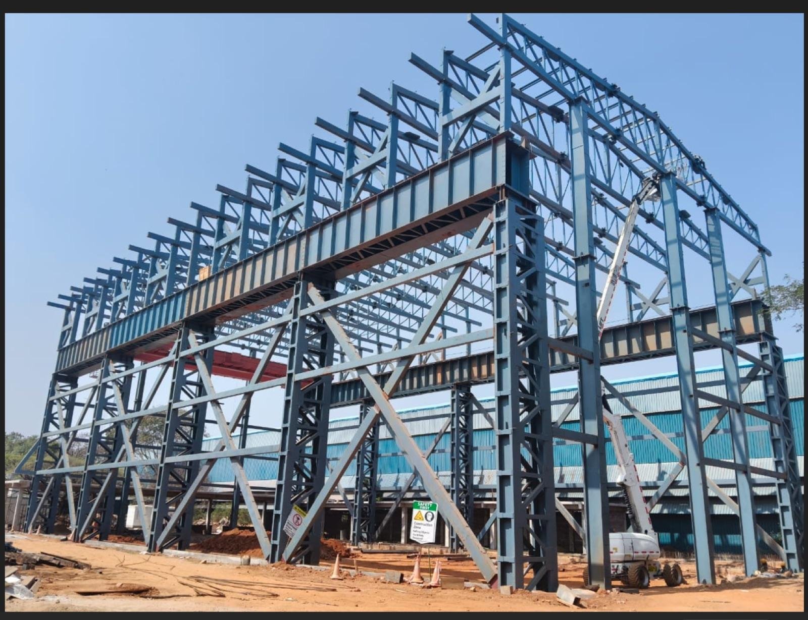 Heavy multi-level steel structural framework under construction